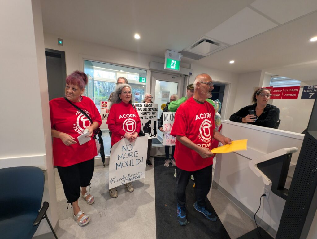 ACORN members drop off their demands at Ottawa Community Housing office.