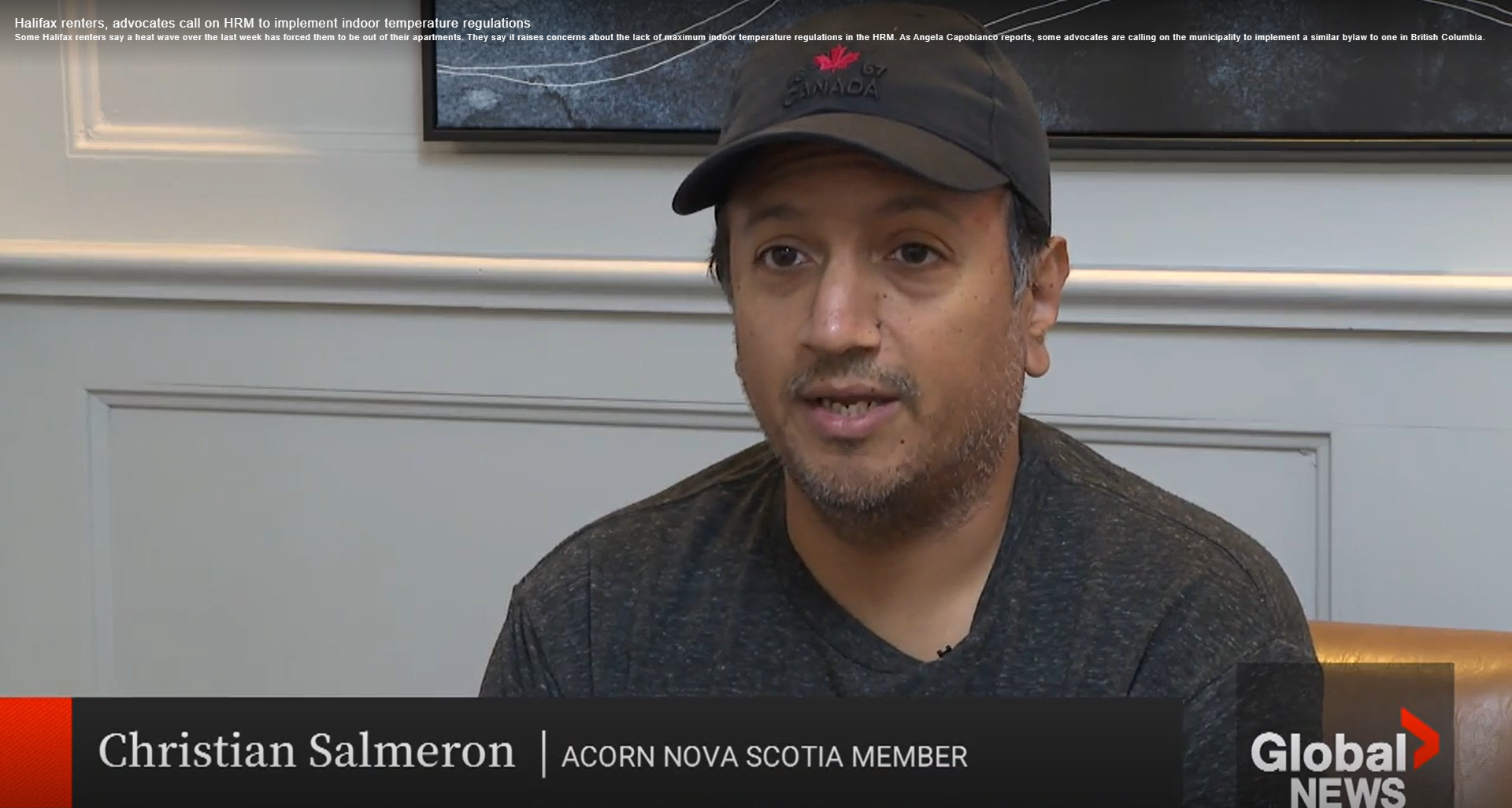Man in a dark cap being interviewed; lower third reads 'Christian Salmeron | ACORN Nova Scotia Member' with the Global News logo.